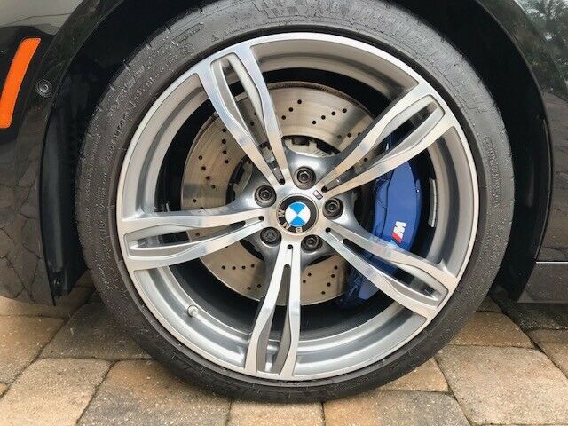 2014 BMW M5 (Black Sapphire Metallic/Sakhir Orange (closer to Red))