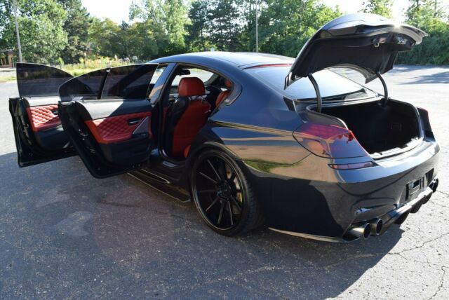 2014 BMW M6 (BLACK METALLIC/TWO TONE RED  & BLACK)