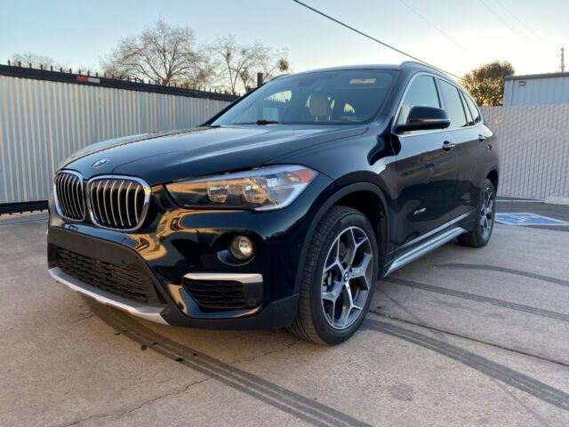 2018 BMW X1 (Black/Beige)