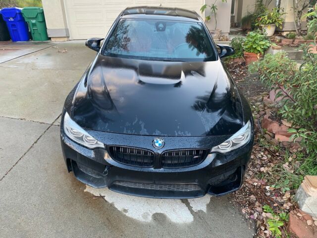 2016 BMW M4 (Black/CRANBERRY RED LEATHER)