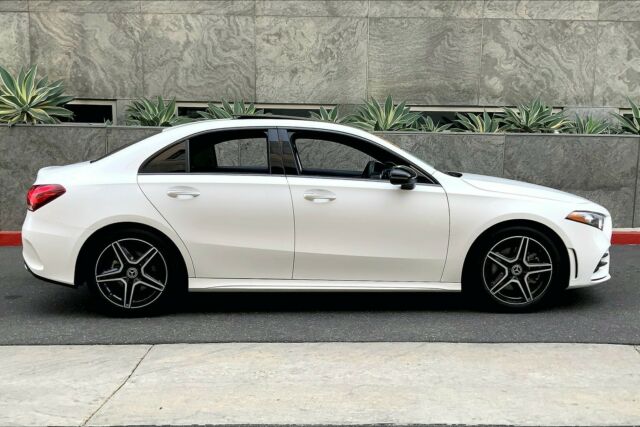 2019 Mercedes-Benz A-Class (POLAR WHITE/BLACK DINAMICA WITH RED STITCHING)